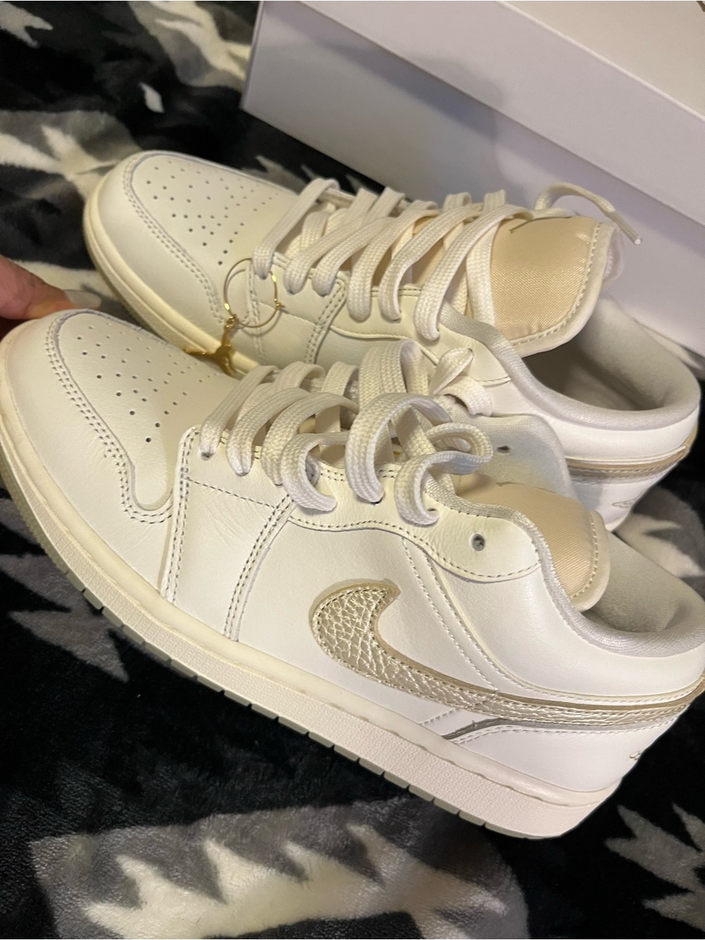 Air Jordan 1 Low Women's Sneakers in Cream with Metallic Gold Swoosh